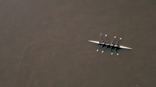A quad from above on flat water